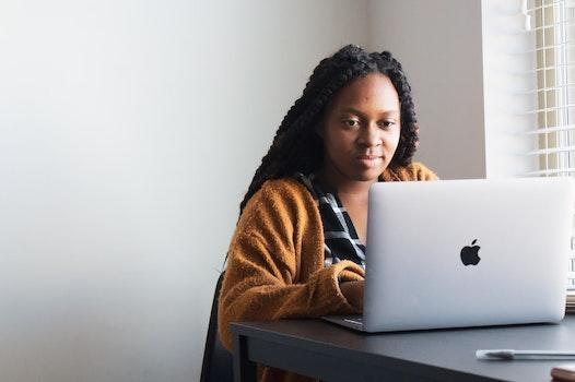 A future SC teacher explores scholarships on her laptop.